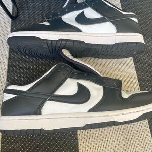 Black and white Nike men’s low dunk shoes, size 10